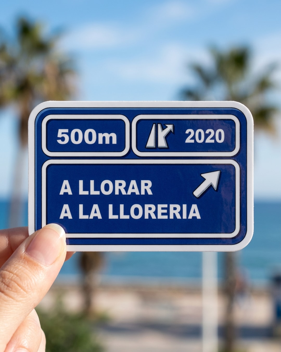 Pegatina Señal de tráfico A llorar a la llorería sostenida en la mano, a tamaño real