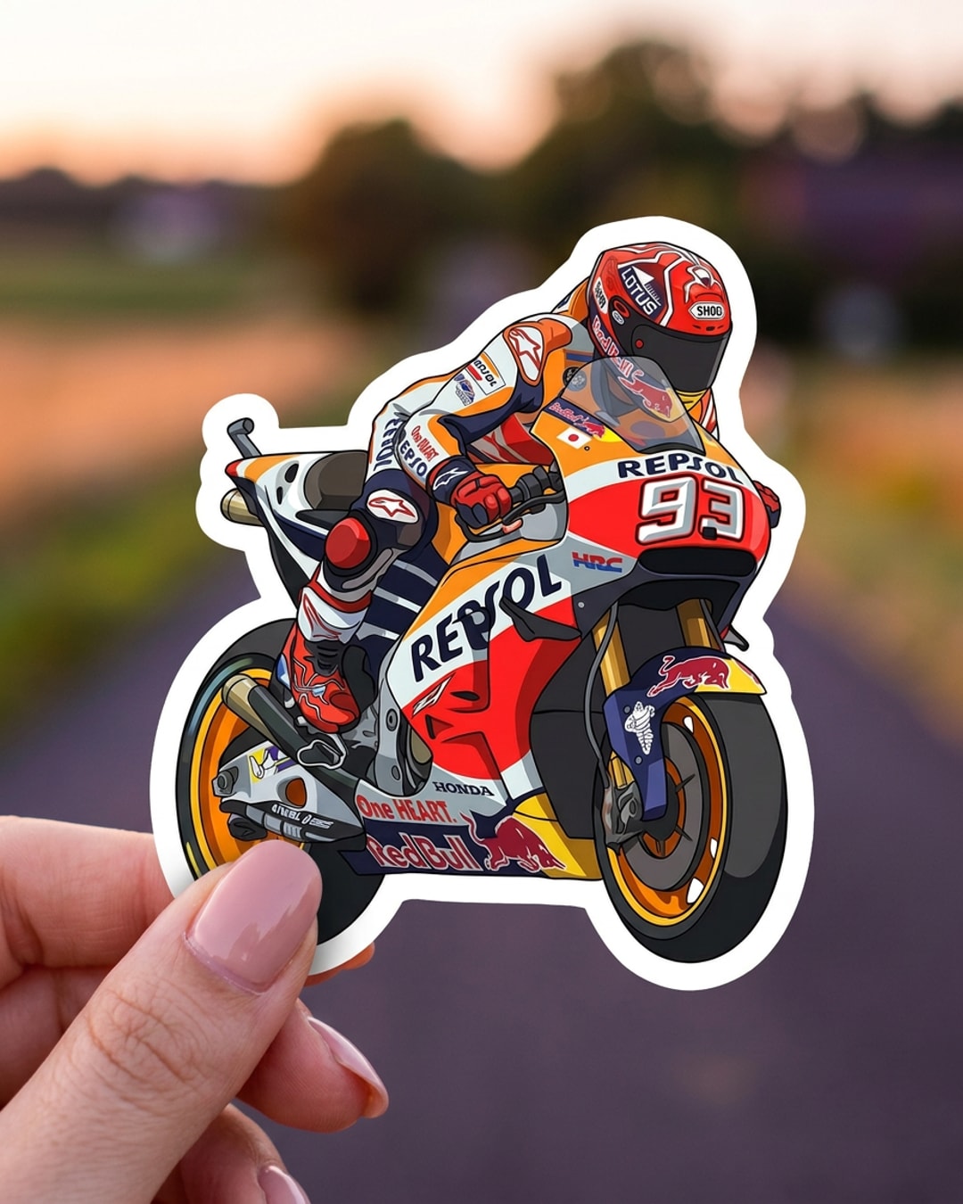 Pegatina Piloto de MotoGP Repsol Número 93 sostenida en la mano, a tamaño real