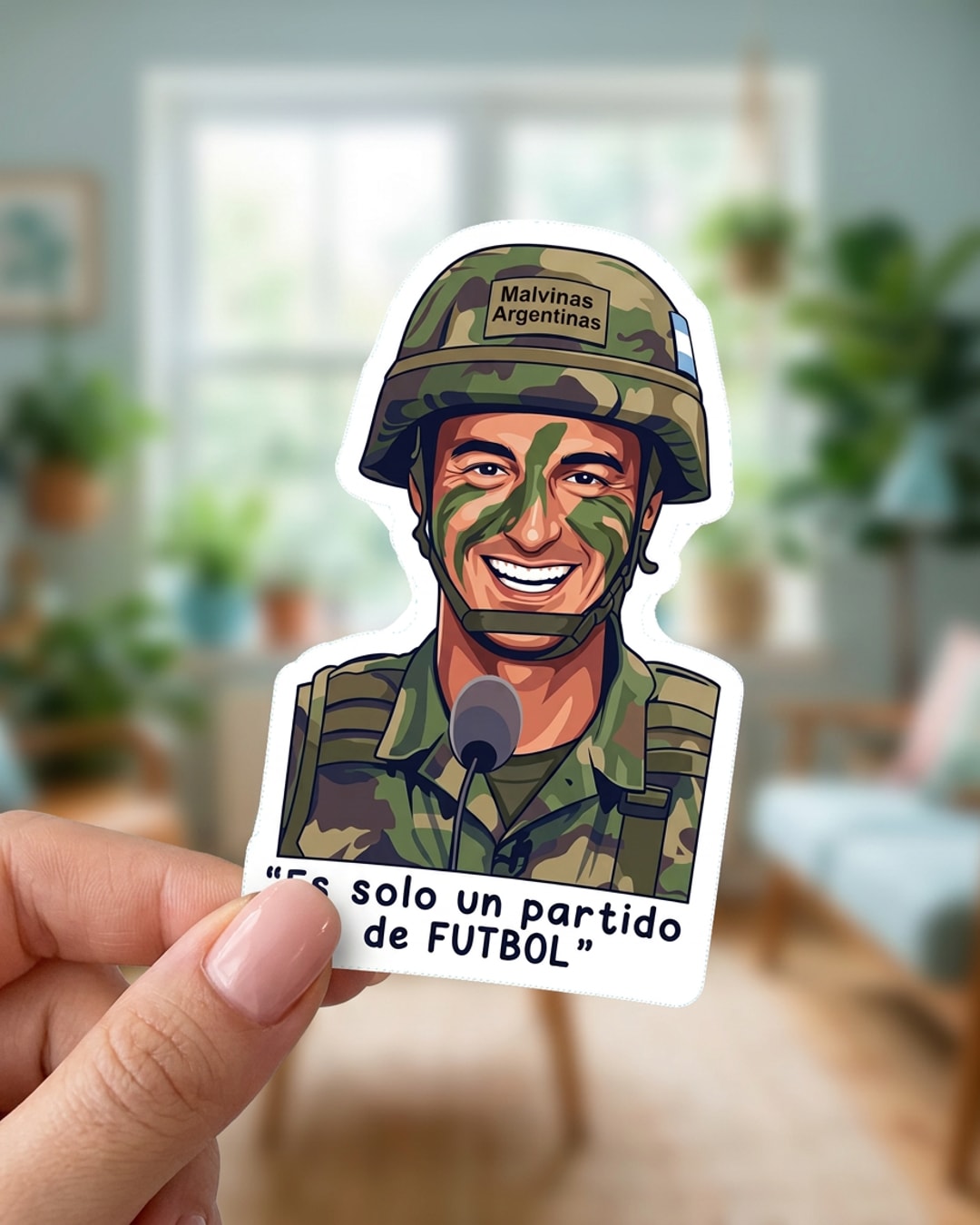 Pegatina Scaloni Militar Es solo un partido de fútbol sostenida en la mano, a tamaño real