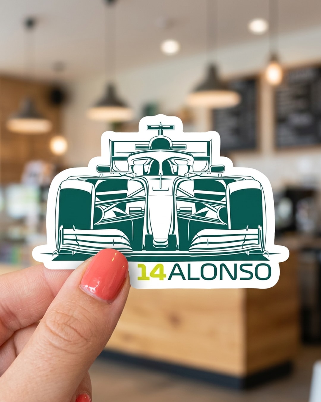 Pegatina Coche F1 Verde 14 Alonso sostenida en la mano, a tamaño real