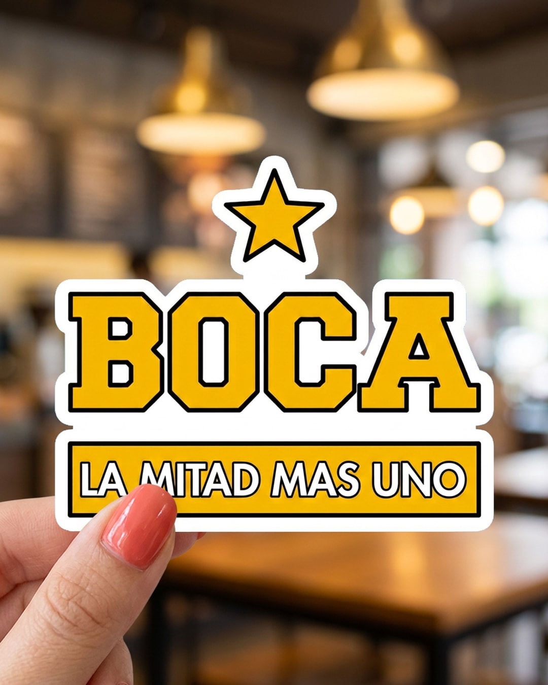 Pegatina Boca La Mitad Mas Uno con estrella sostenida en la mano, a tamaño real